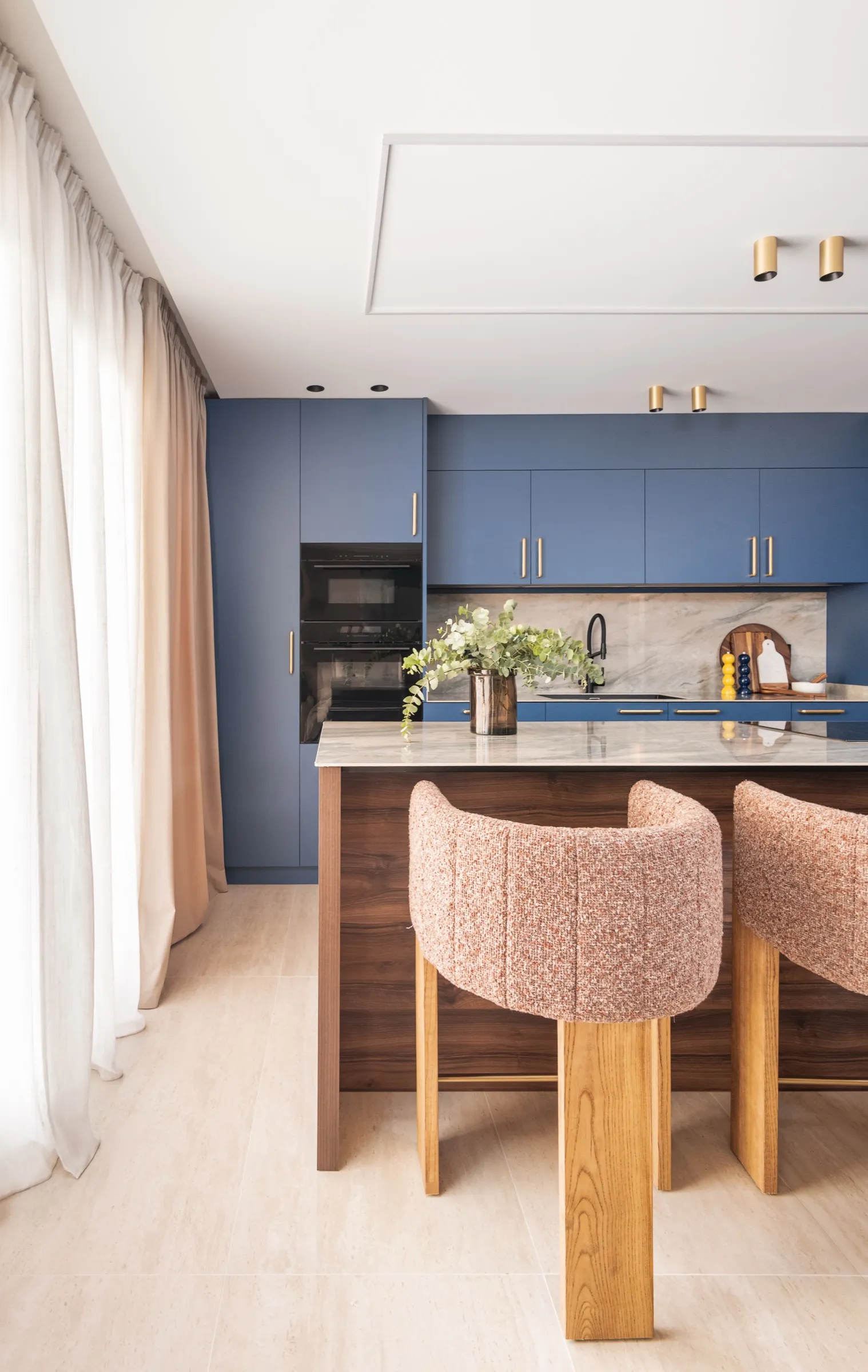 View of the cosmic blue kitchen from the dining room